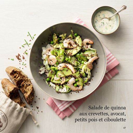 Quinoa salad with shrimp, avocado, peas, and chives