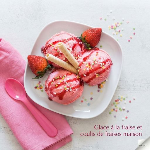 Strawberry ice cream with homemade strawberry coulis