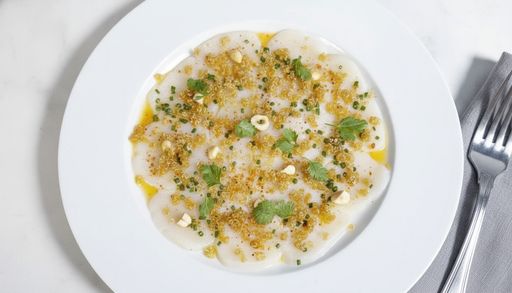 Scallop carpaccio, fried quinoa, lemon-hazelnut vinaigrette